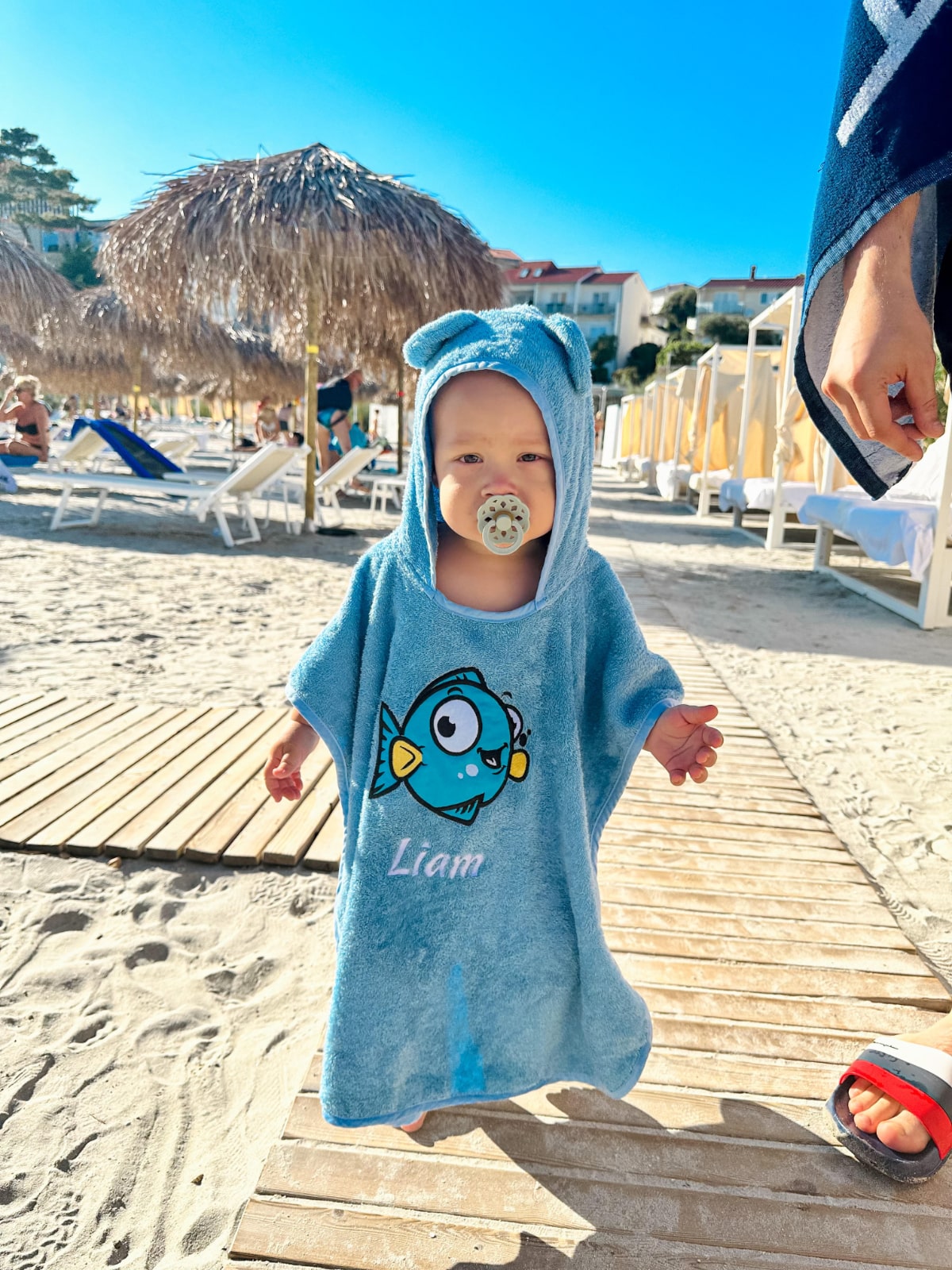 Baby Liam with personalized poncho